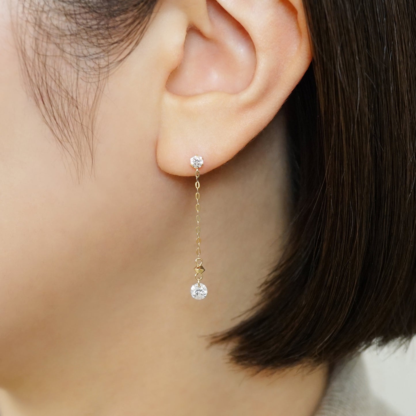 10K Glittering Dangle Earrings (Yellow Gold) - Model Image