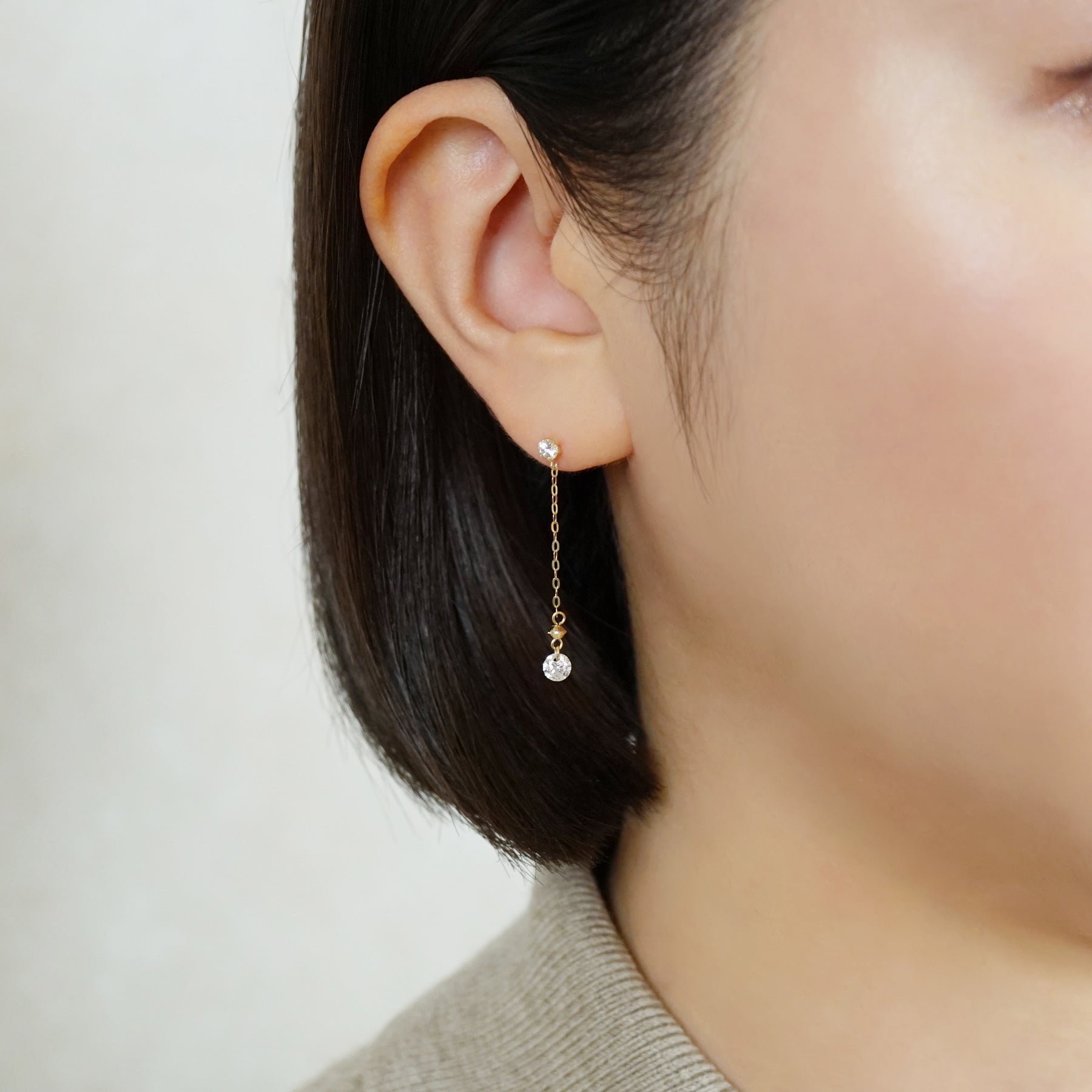 10K Glittering Dangle Earrings (Yellow Gold) - Model Image