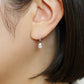 10K Drop Swinging Earrings (White Gold) - Model Image