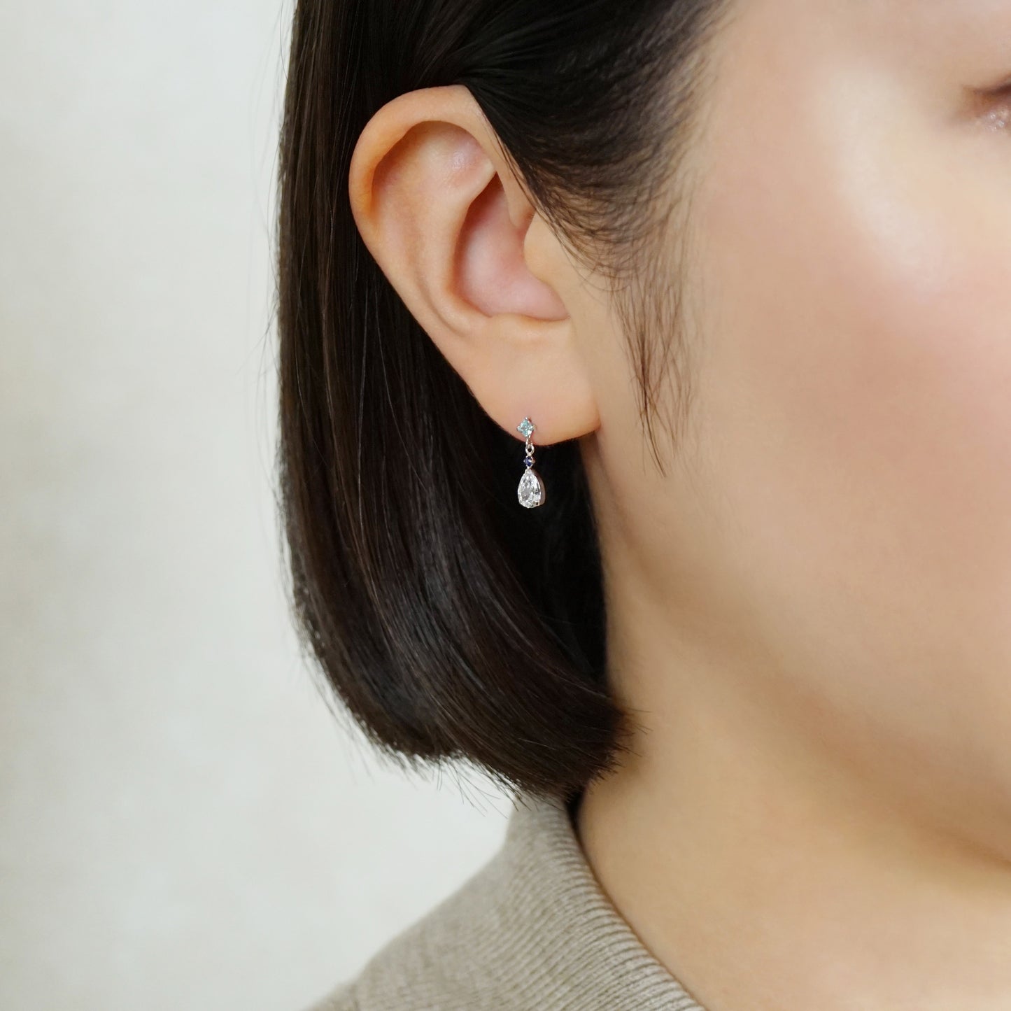 10K Drop Swinging Earrings (White Gold) - Model Image