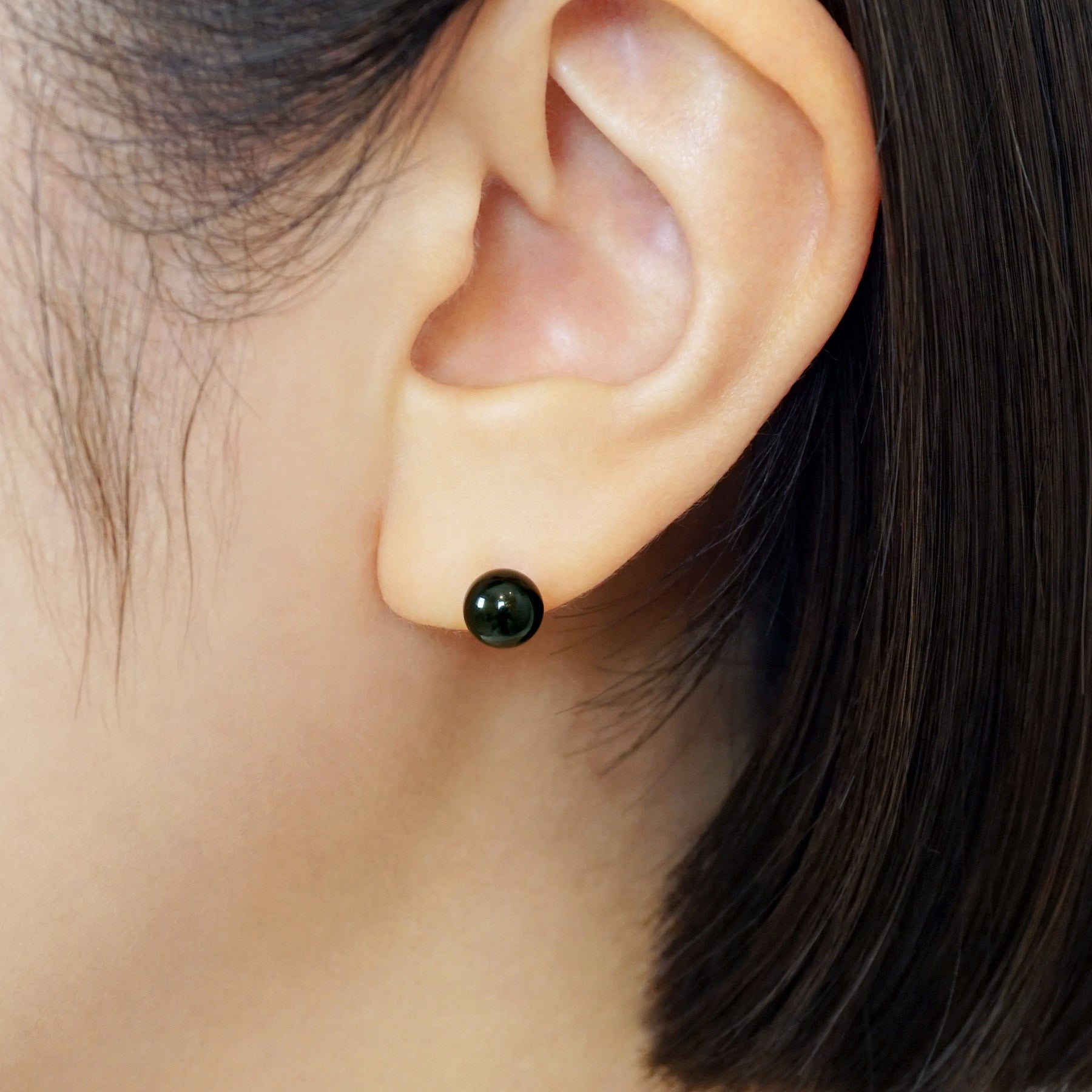 Onyx Ball Ceramic Post Earrings - Model Image