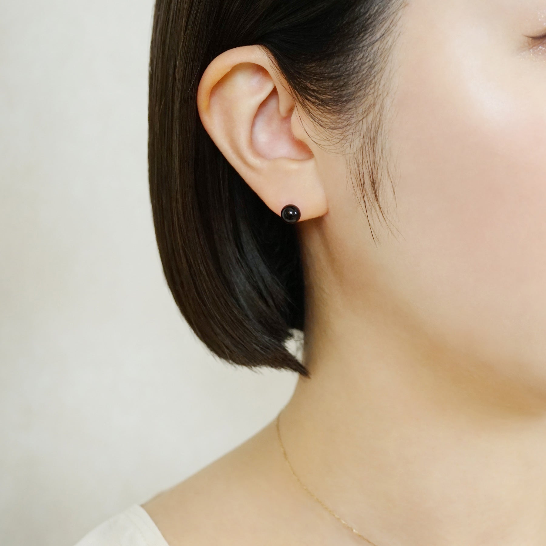 Onyx Ball Ceramic Post Earrings - Model Image