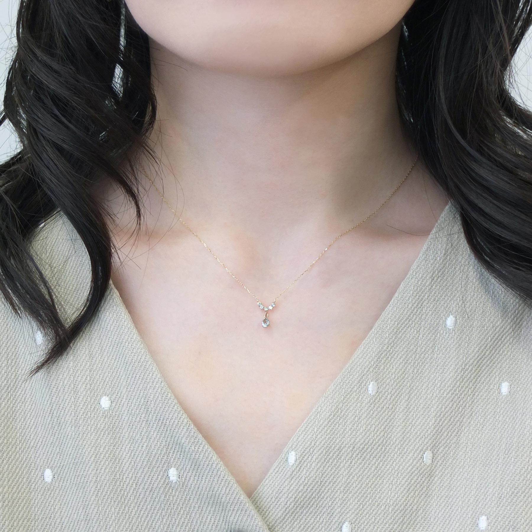 10K Yellow Gold Aquamarine Swinging Necklace - Model Image