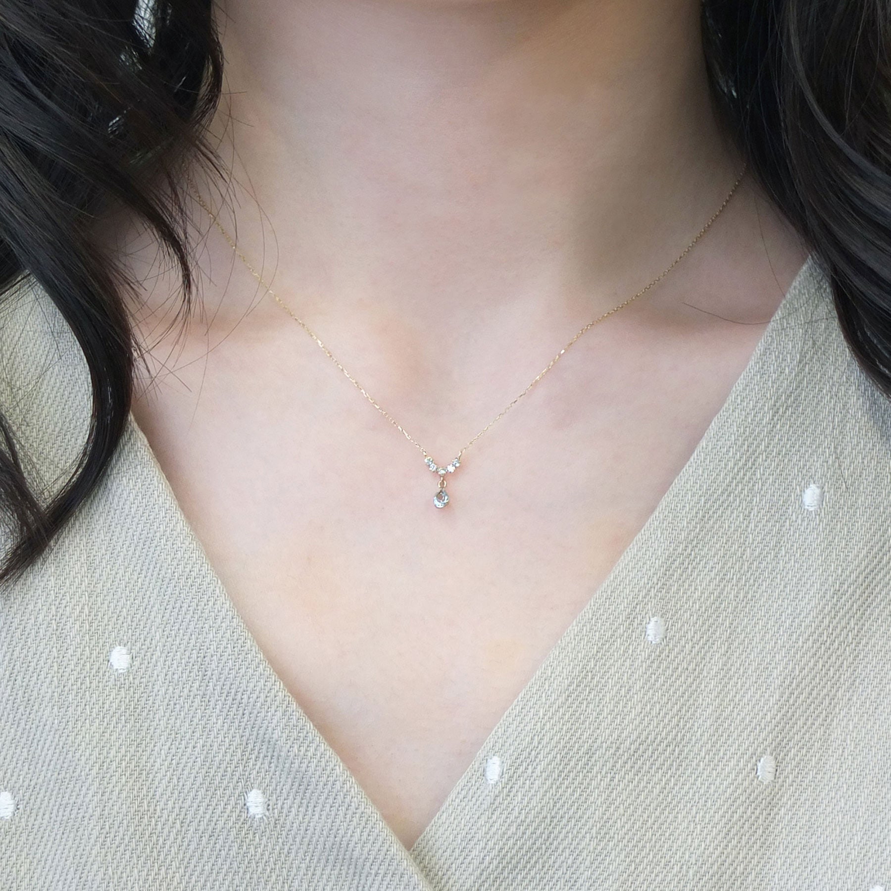 10K Yellow Gold Aquamarine Swinging Necklace - Model Image
