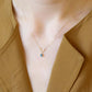 10K Yellow Gold Birthstone (Swiss Blue Topaz) Swinging Necklace - Model Image