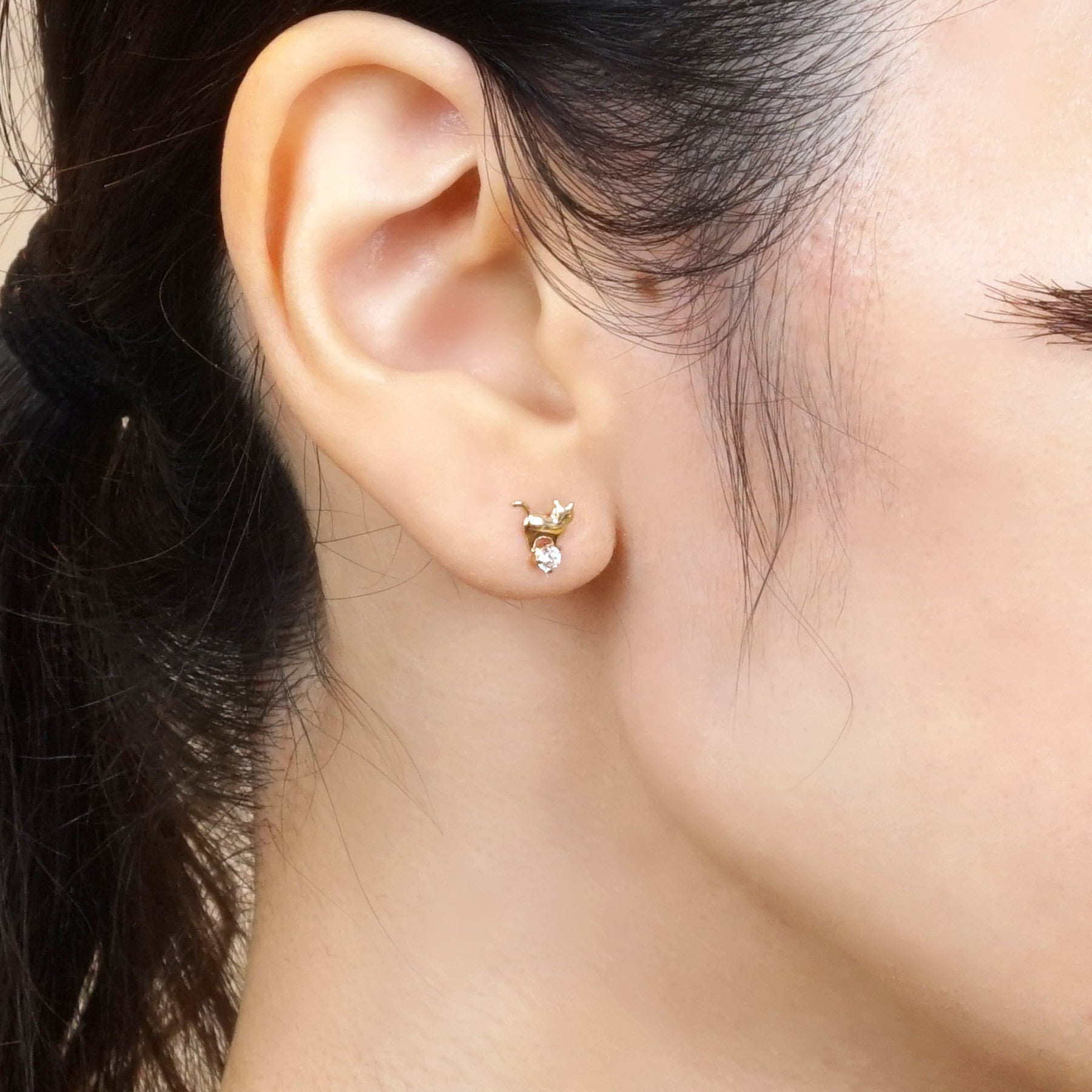 18K/10K Yellow Gold Playing Cat Earrings - Model Image