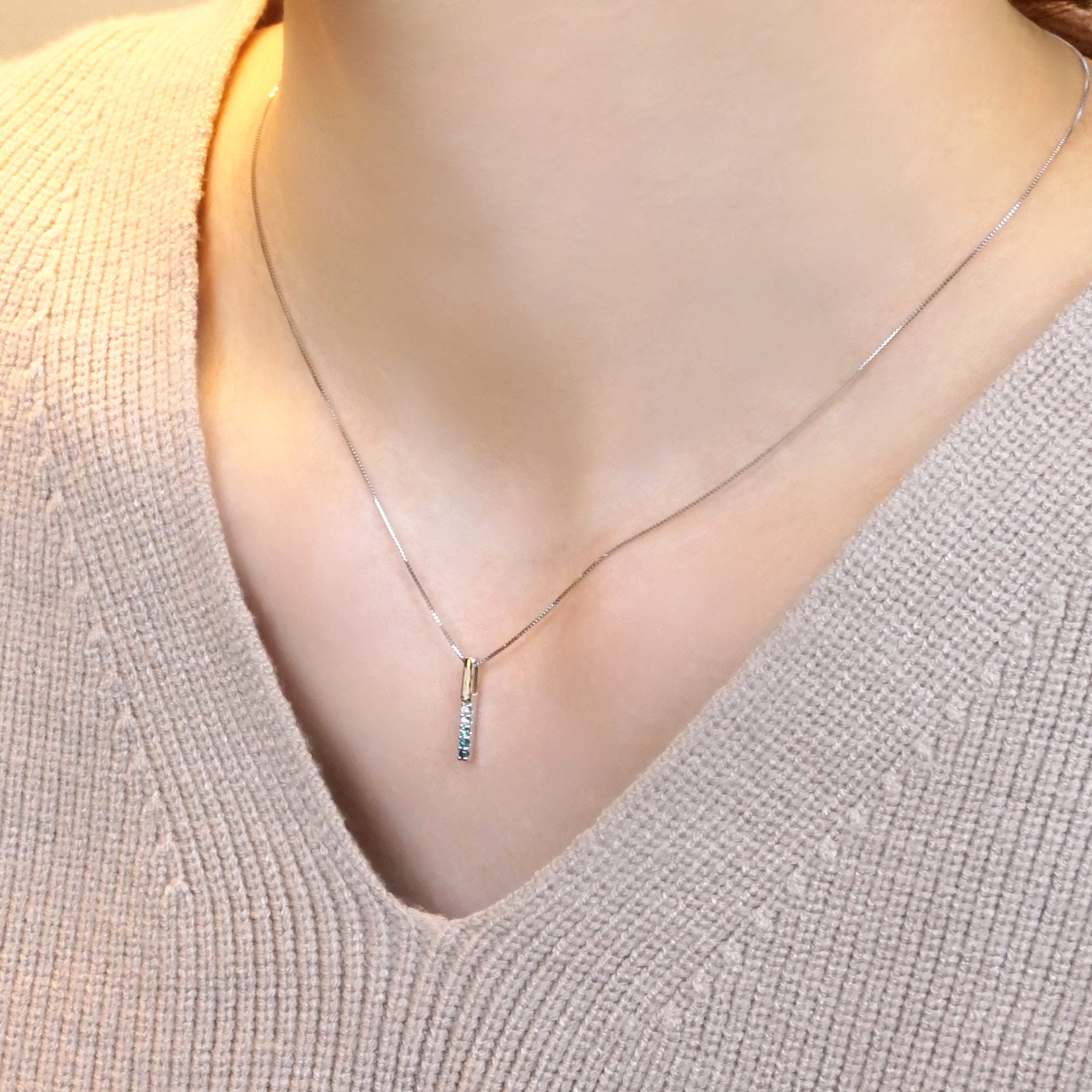 Ice Blue Diamond Gradient Straight Bar Necklace (10K White Gold) - Model Image