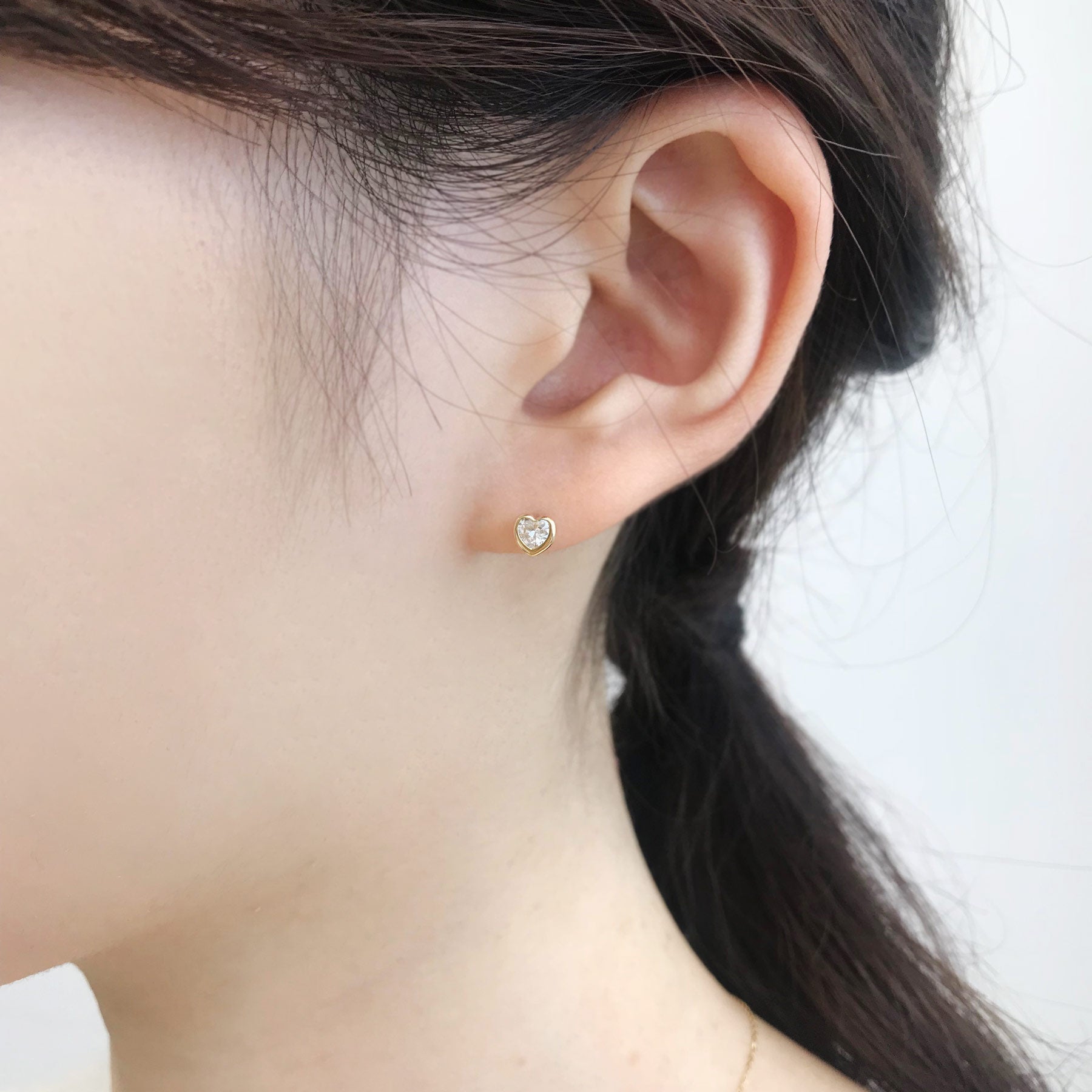 [Second Earrings] 18K Yellow Gold Cubic Zirconia Heart Cut Earrings - Model Image