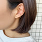 10K Yellow Gold Glittering Wave Ear Cuff - Model Image