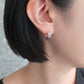 14K/10K White Gold Double Twist Hoop Earrings - Model Image