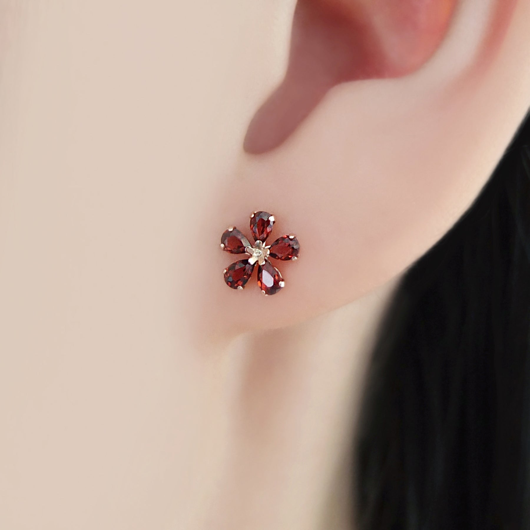 18K / 10K Rose Gold Garnet Flower Earrings - Model Image