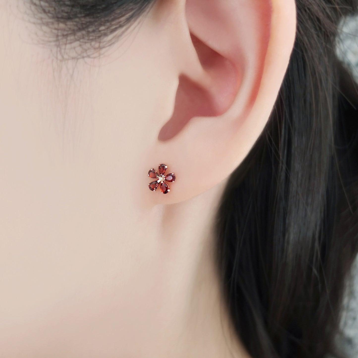 18K / 10K Rose Gold Garnet Flower Earrings - Model Image