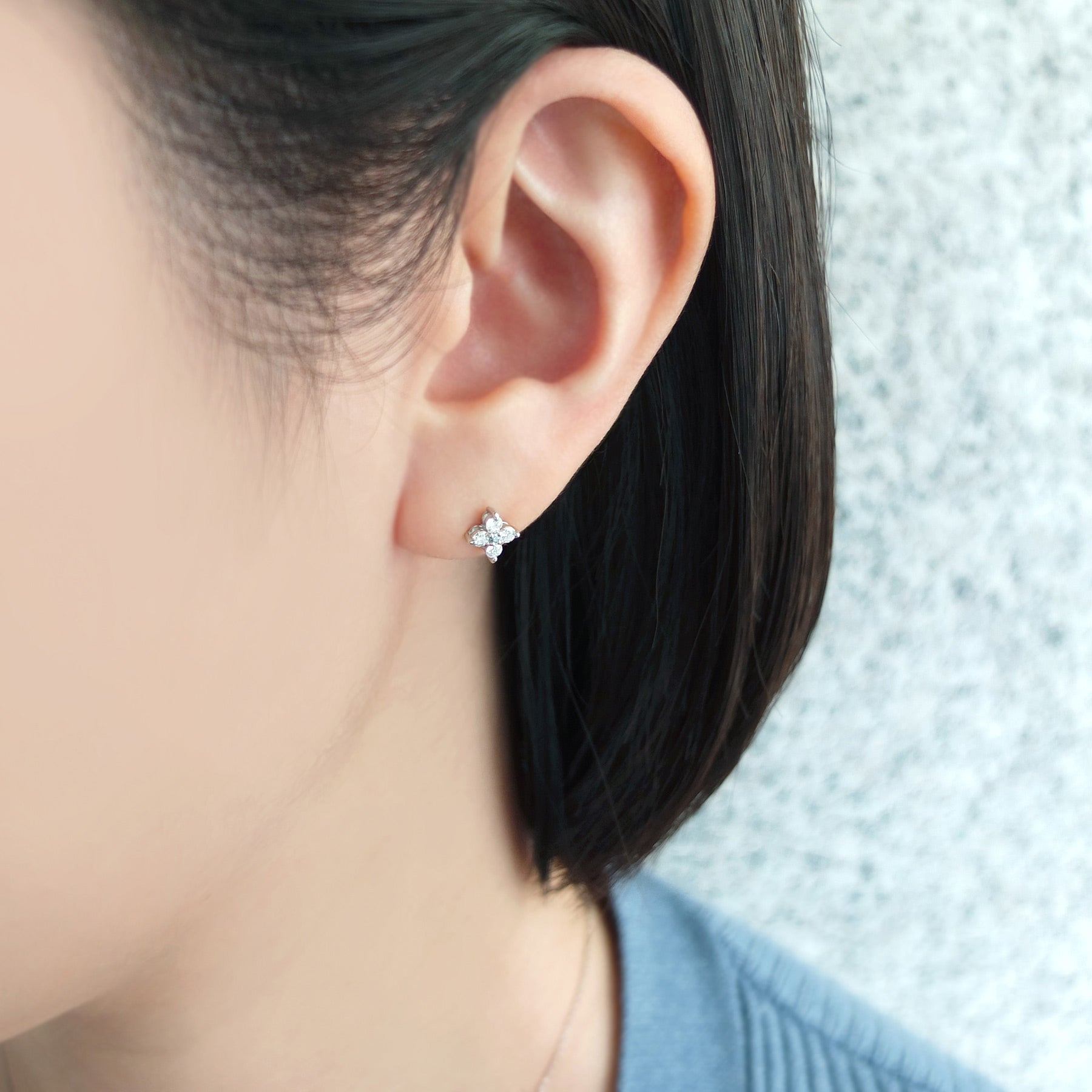 Platinum Diamond Flower Earrings - Model Image