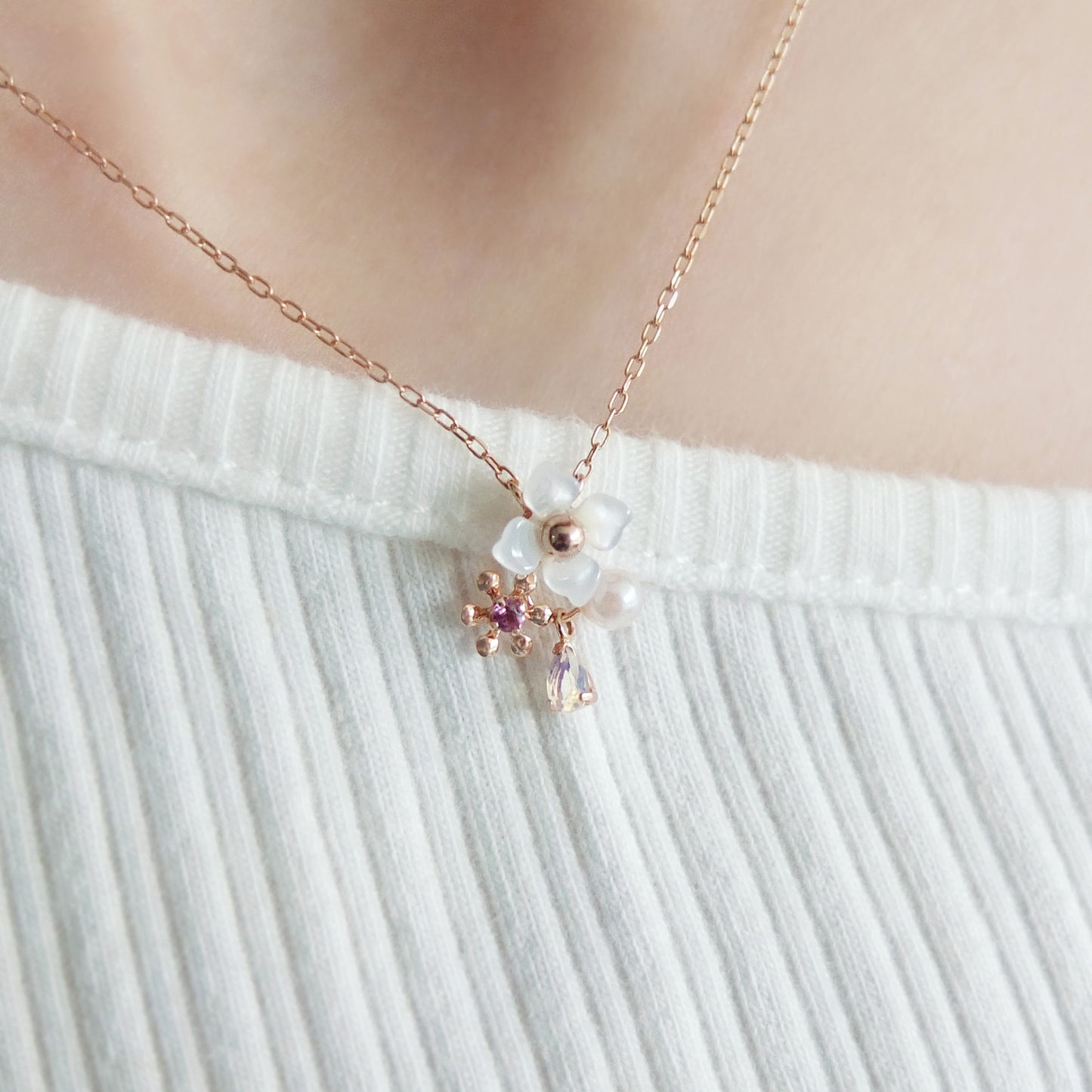 10K Rose Gold Rhodolite Garnet Holy Flower Necklace - Model Image