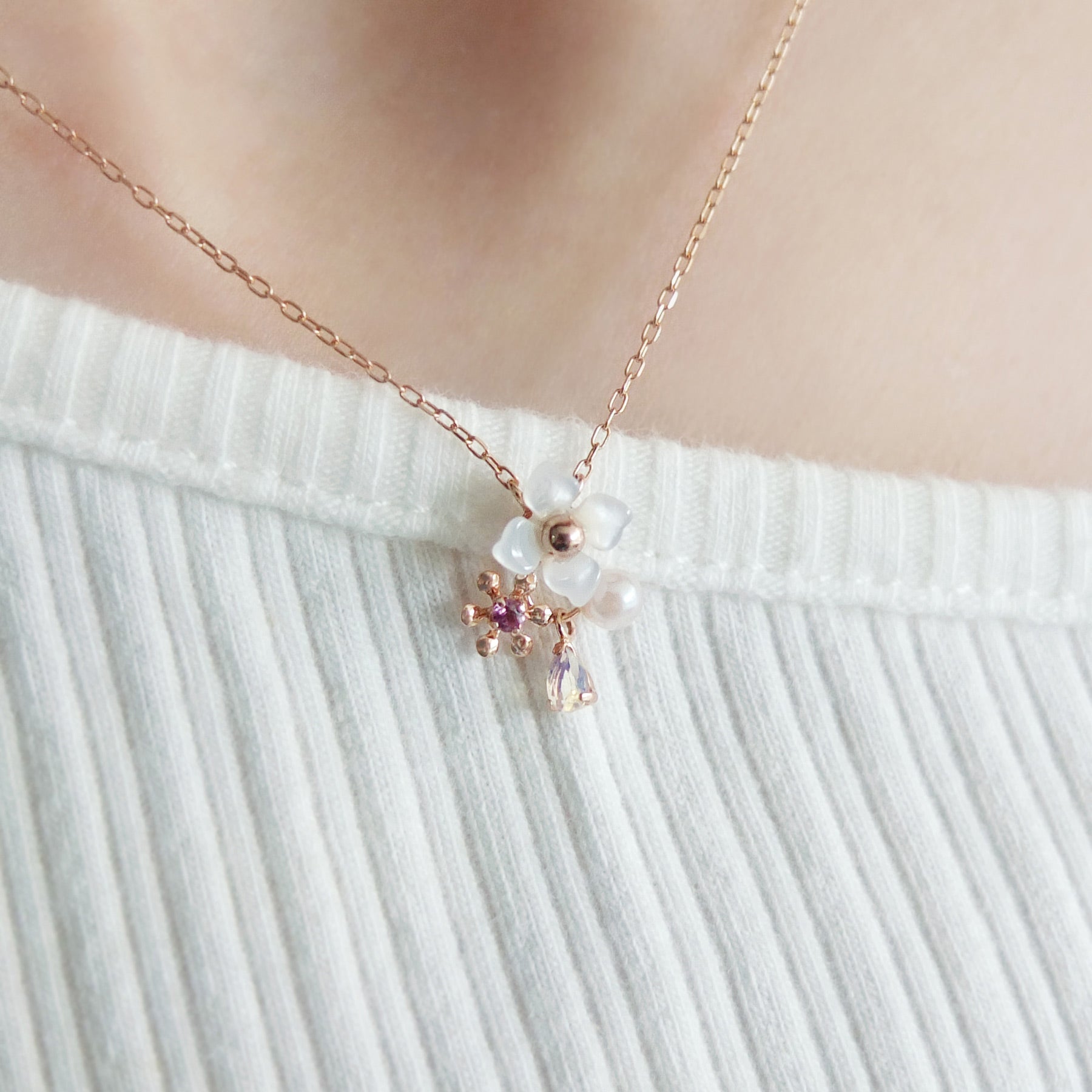 10K Rose Gold Rhodolite Garnet Holy Flower Necklace - Model Image
