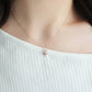 10K Rose Gold Rhodolite Garnet Holy Flower Necklace - Model Image