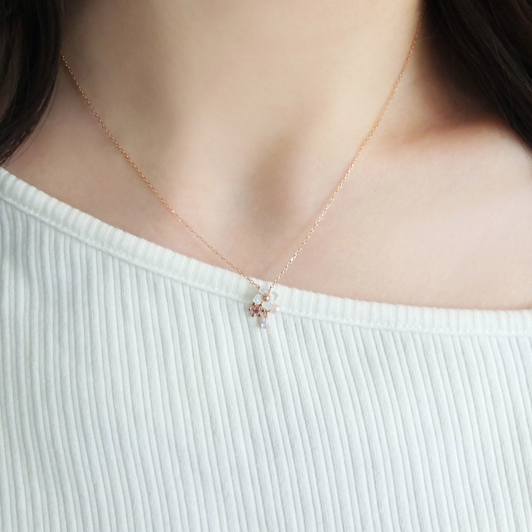 10K Rose Gold Rhodolite Garnet Holy Flower Necklace - Model Image