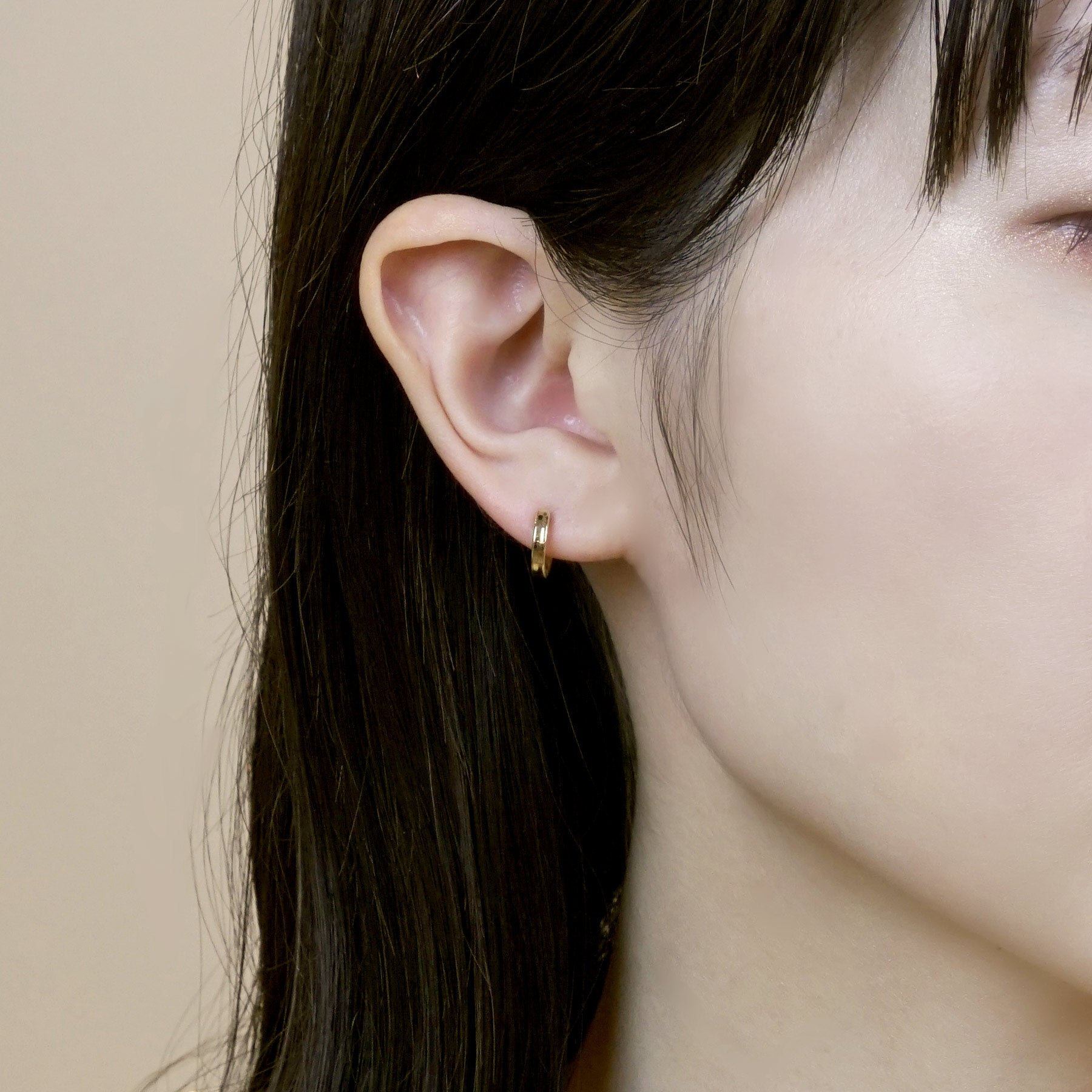 18K/10K Yellow Gold Basic Mini Hoop Earrings - Model Image