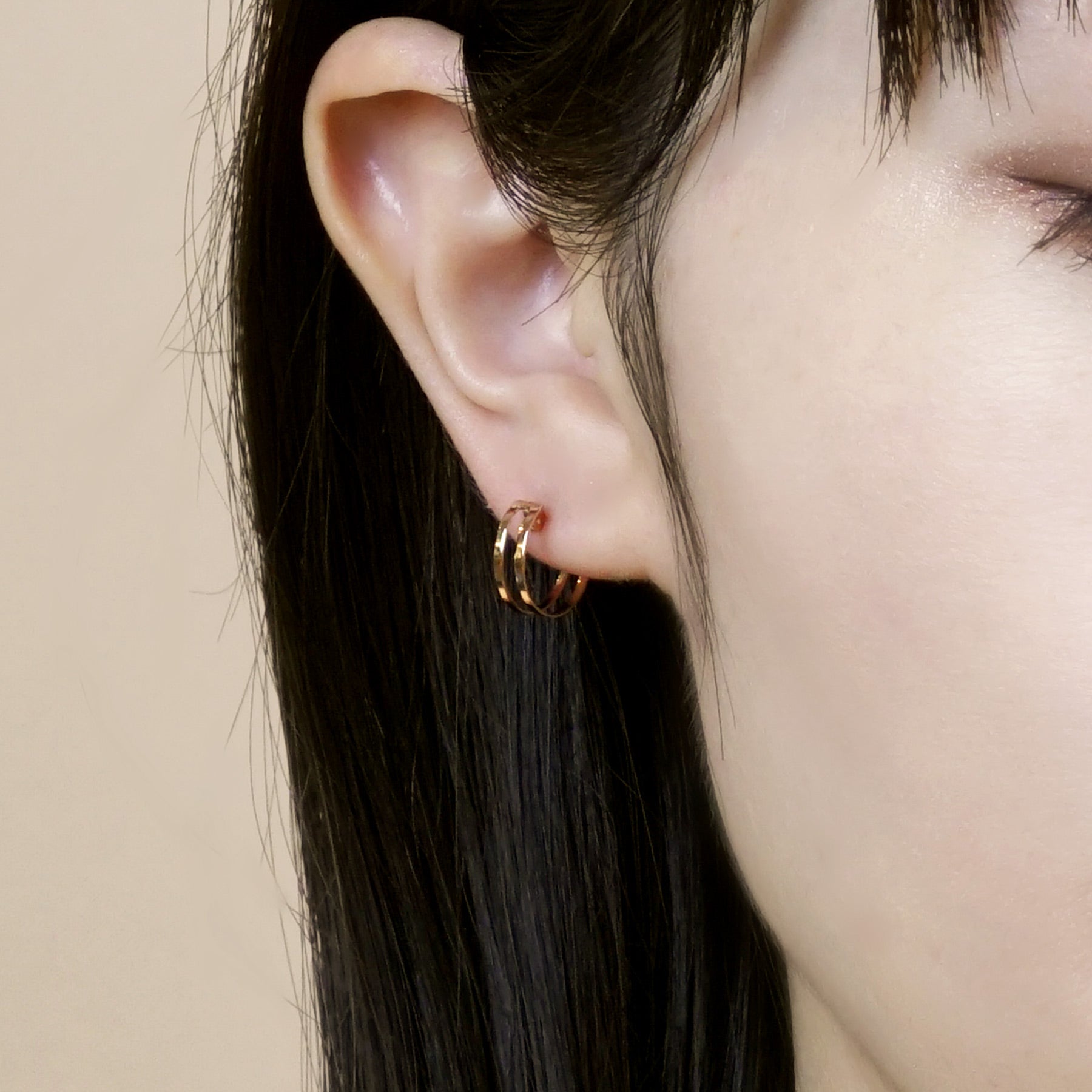 18K/10K Rose Gold Mini Hoop Earrings - Model Image
