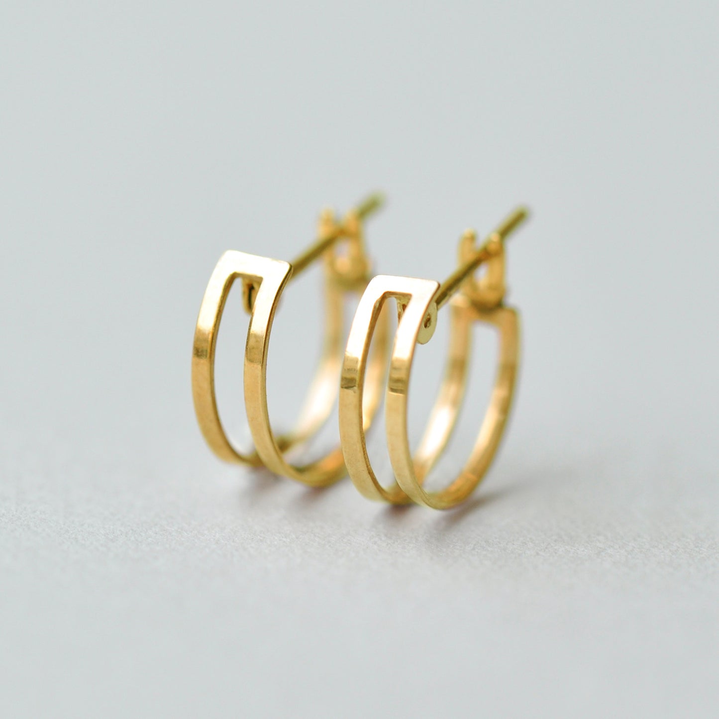 18K/10K Yellow Gold Mini Hoop Earrings - Product Image