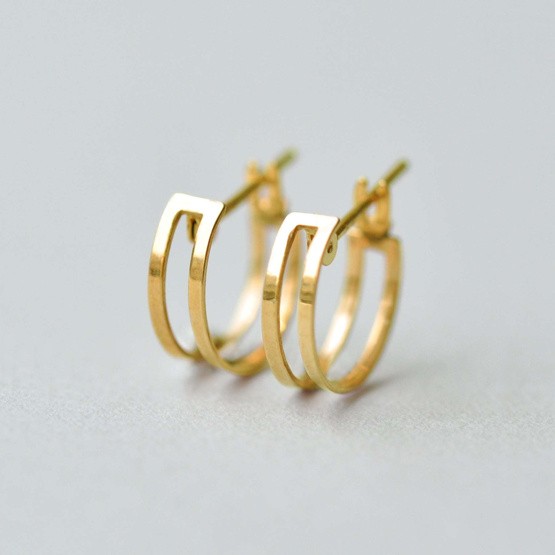 18K/10K Yellow Gold Mini Hoop Earrings - Product Image