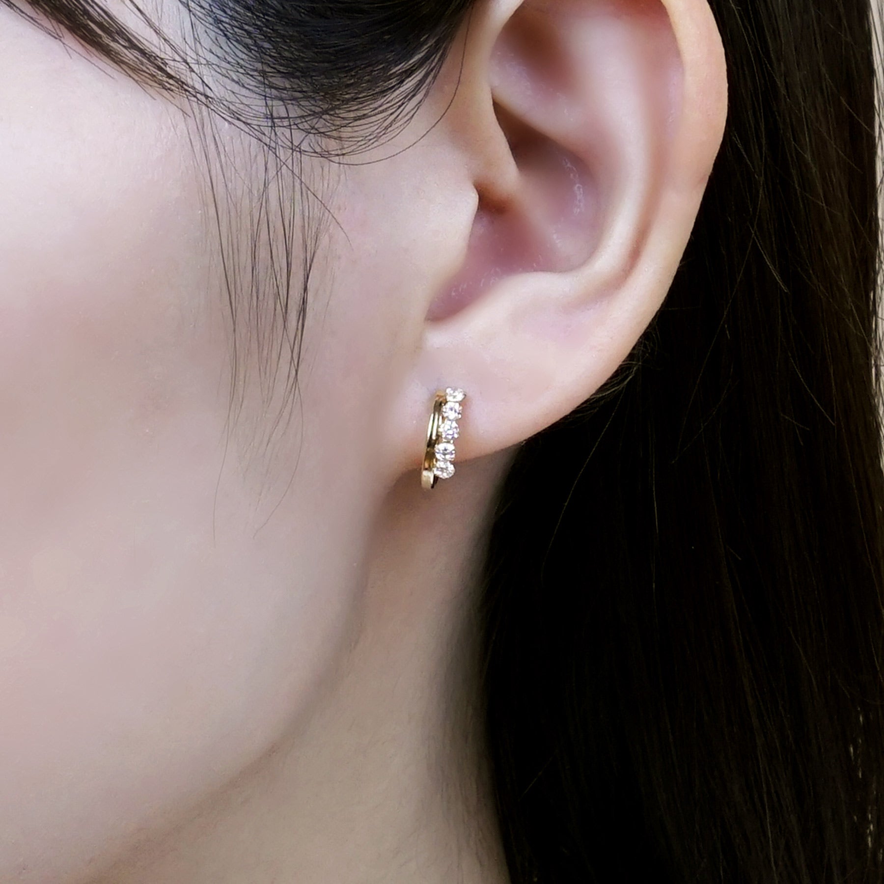 14K/10K Yellow Gold Cubic Zirconia Hoop Earrings - Model Image